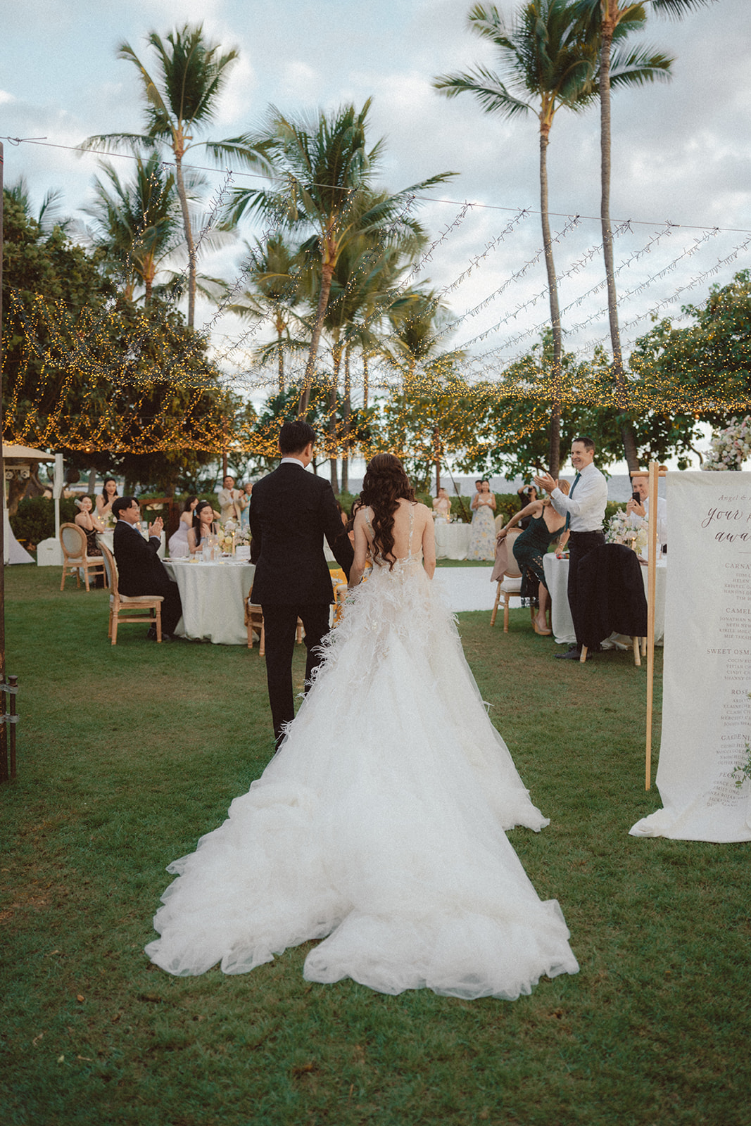 An elevated oceanfront micro wedding at Four Seasons Resort Ko Olina on Oahu featuring a traditional tea ceremony, seafood cocktail hour, and intimate reception under string lights.