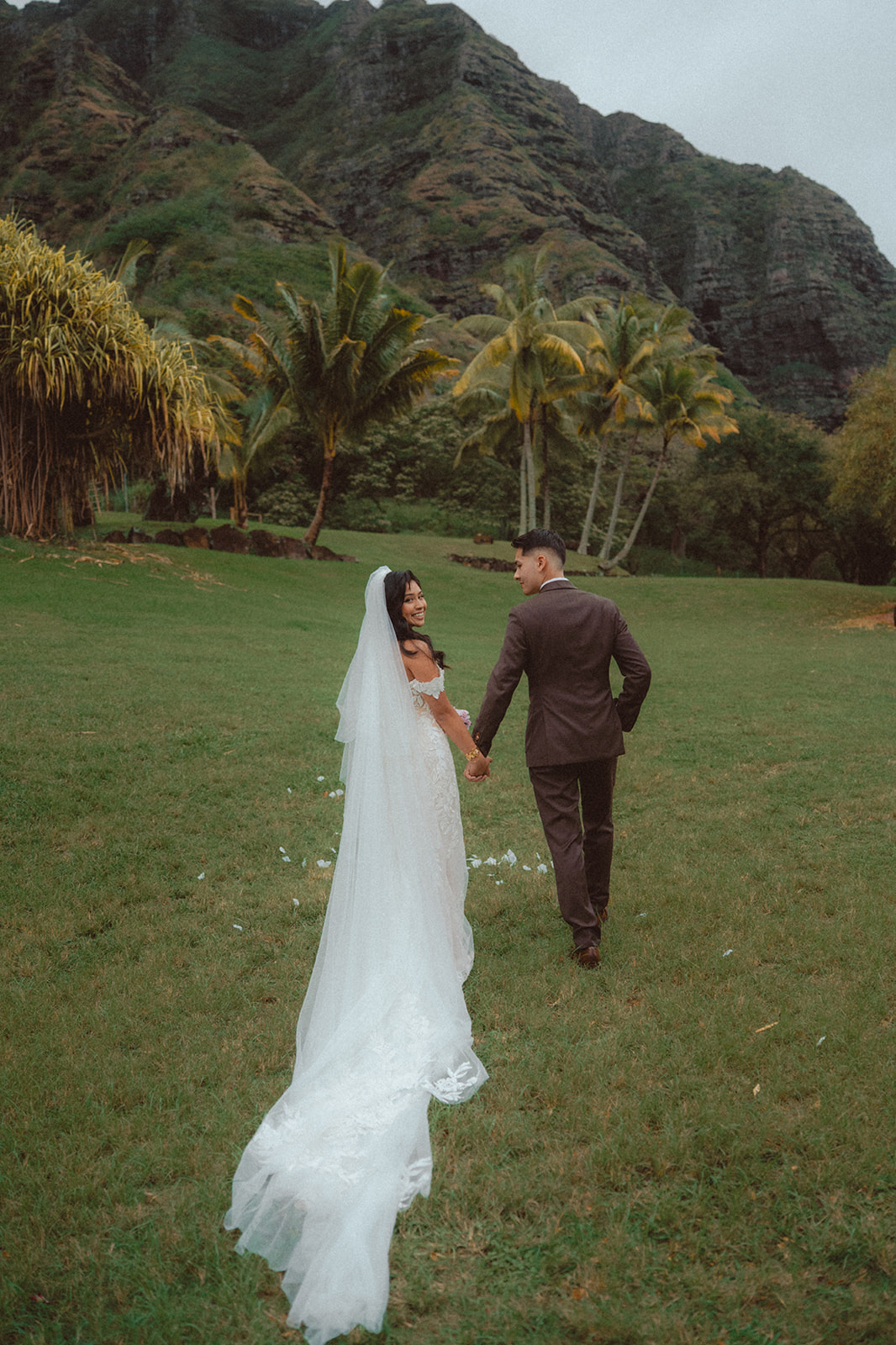 Inside Shawn & Alexis’ playful wedding at Palikū Gardens at Kualoa Ranch —butter yellow bridesmaids, custom linen signage, and a gelato bar.
